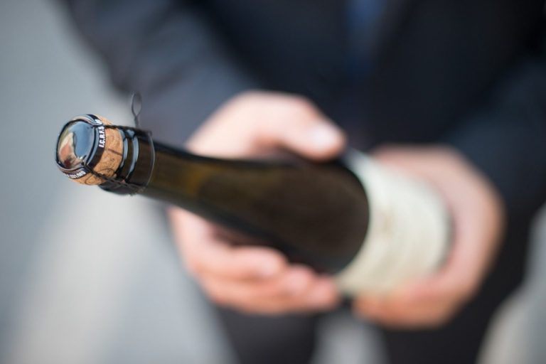 Bottle with cork popping